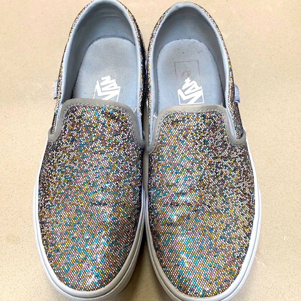 Vans slip on sneakers.